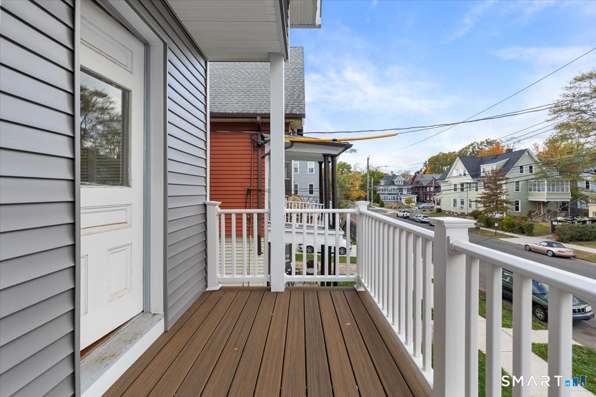 36 Maple Street, Unit 2 New Haven, CT 06511 - Photo 19 of 20 a view of a balcony with wooden floor