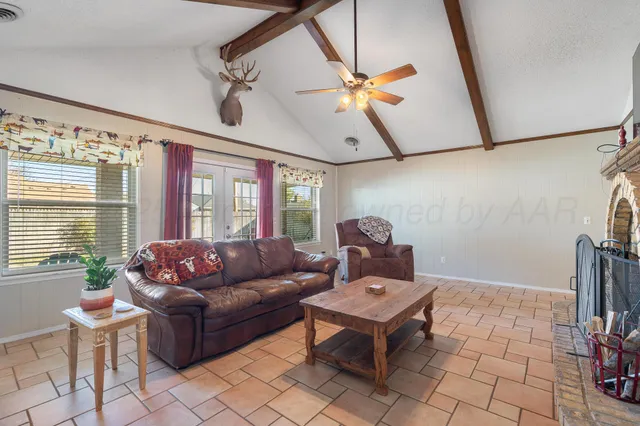 a bed room with a bed and a fireplace