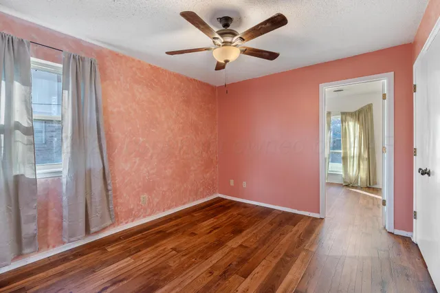 a bathroom with a sink and a large mirror