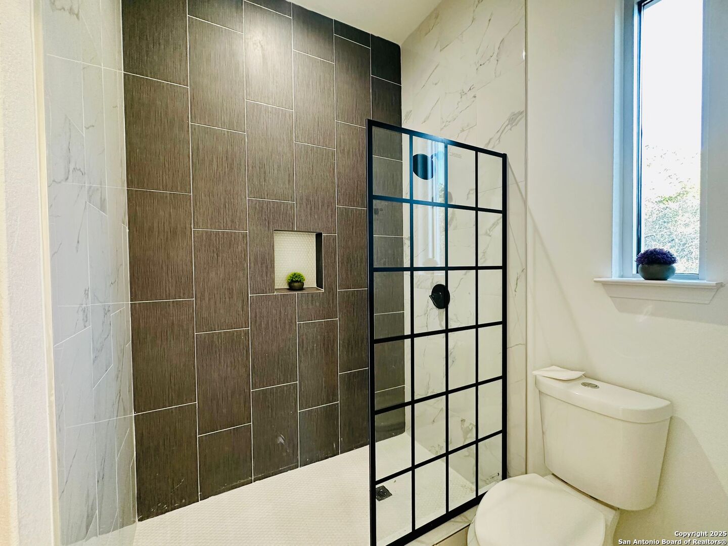 1064 Overbrook Lane Spring Branch, TX 78070 - Photo 21 of 34 a bathroom with a toilet and a shower