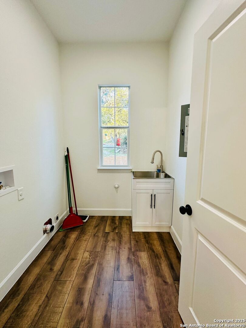 1064 Overbrook Lane Spring Branch, TX 78070 - Photo 27 of 34 a room with a window and wooden floor