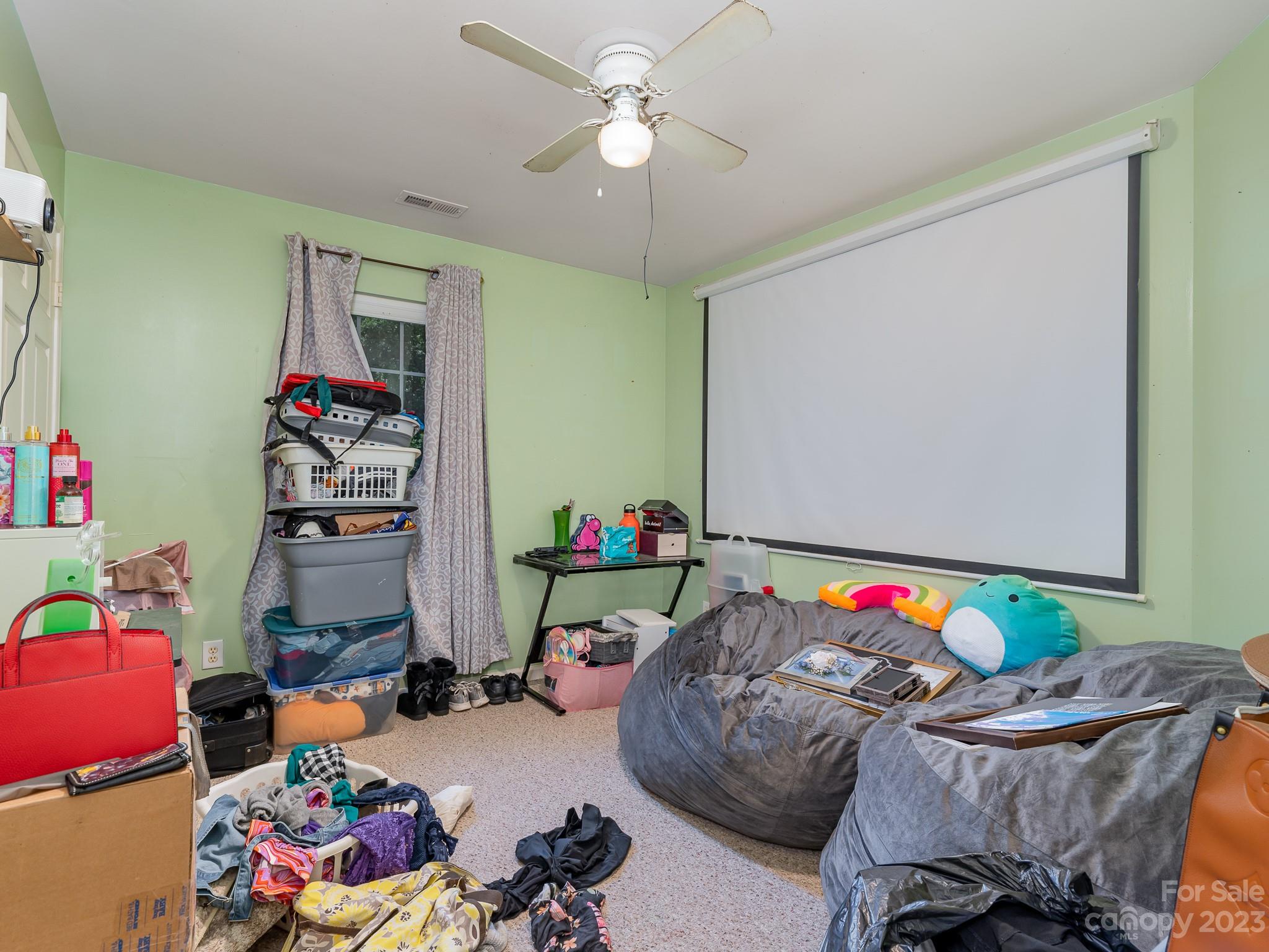 12119 Shadow Ridge Lane Charlotte, NC 28273 - Photo 21 of 28 a living room with baby toys and furniture