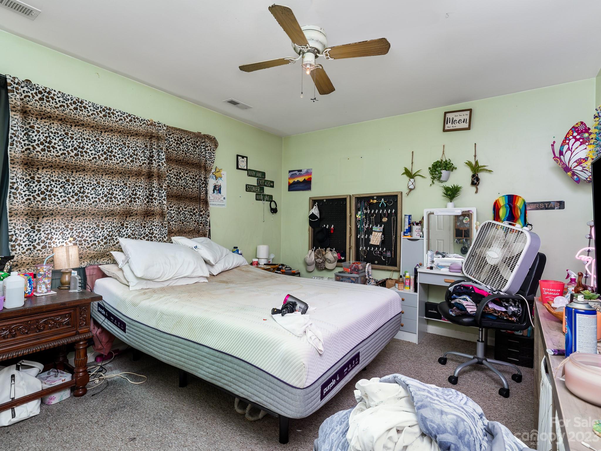 12119 Shadow Ridge Lane Charlotte, NC 28273 - Photo 23 of 28 a bedroom with a bed and a table in it