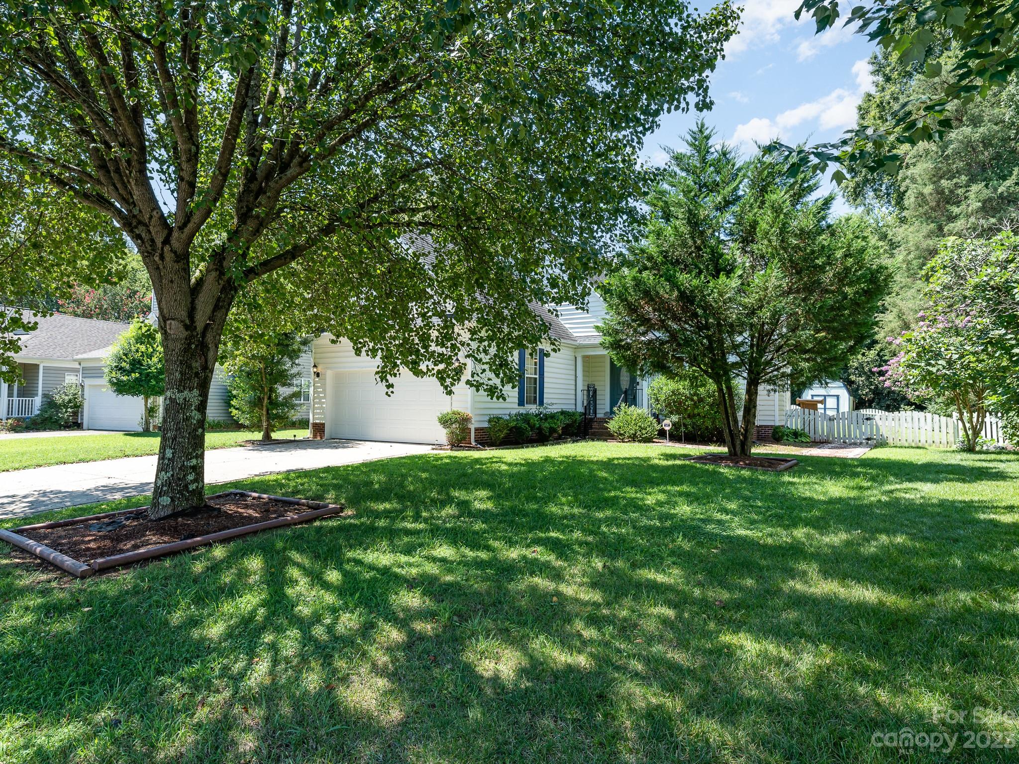 12119 Shadow Ridge Lane Charlotte, NC 28273 - Photo 3 of 28 a view of a house with a backyard
