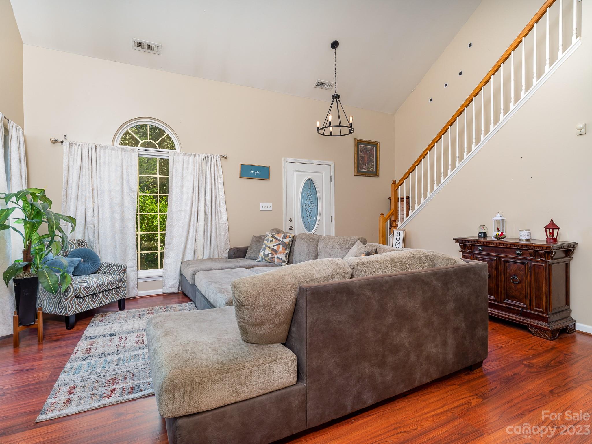 12119 Shadow Ridge Lane Charlotte, NC 28273 - Photo 5 of 28 a living room with furniture and wooden floor