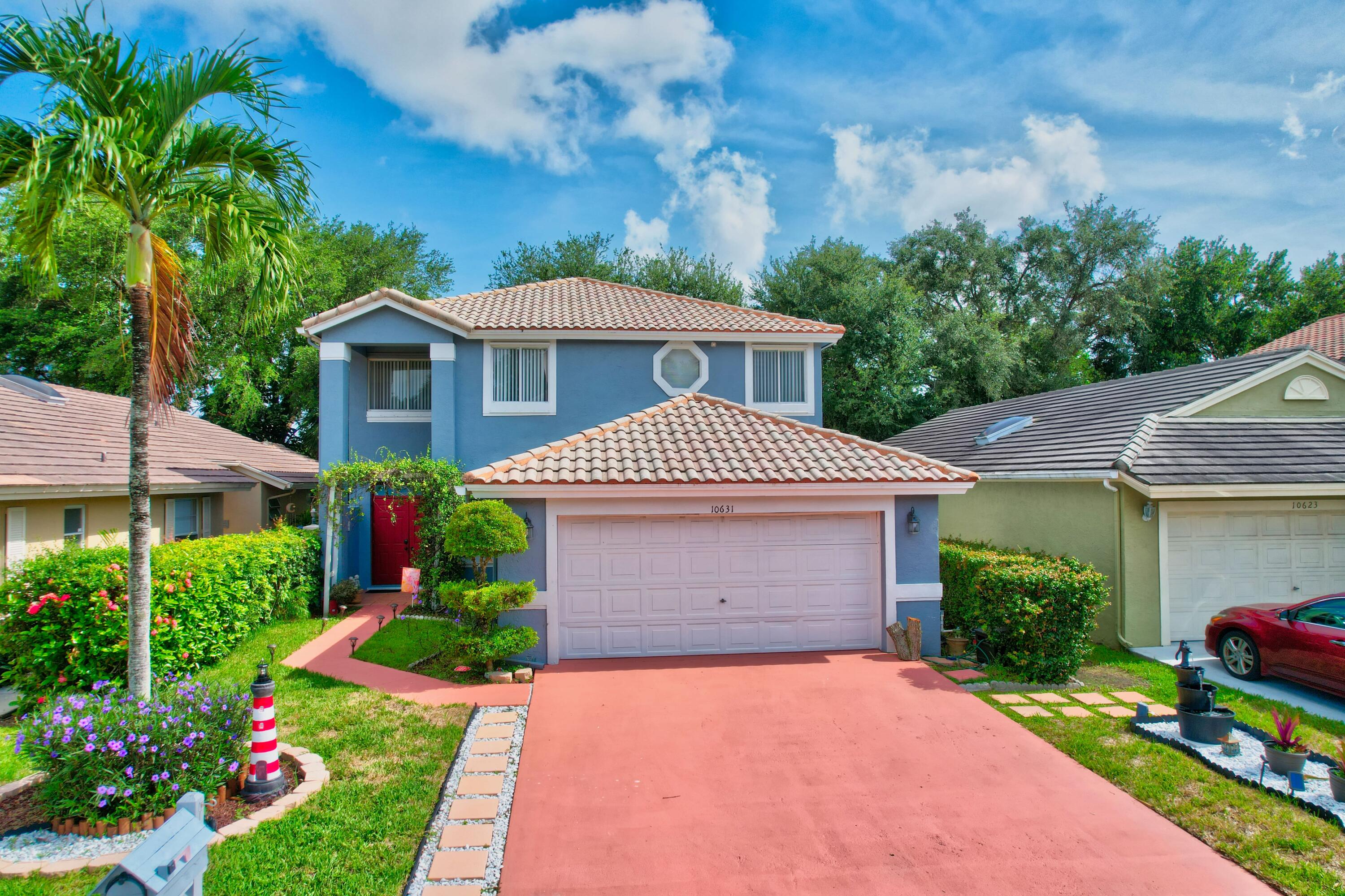 10631 Palm Spring Drive Boca Raton, FL 33428 - Photo 37 of 44 front