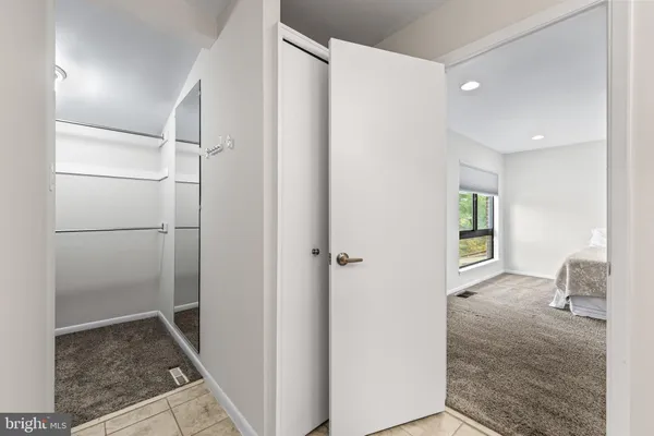 a bathroom with a shower and a sink