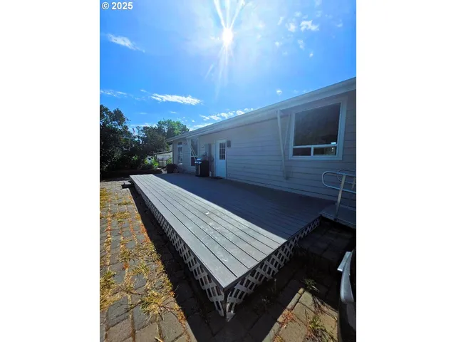 a view of a street with a building in the background