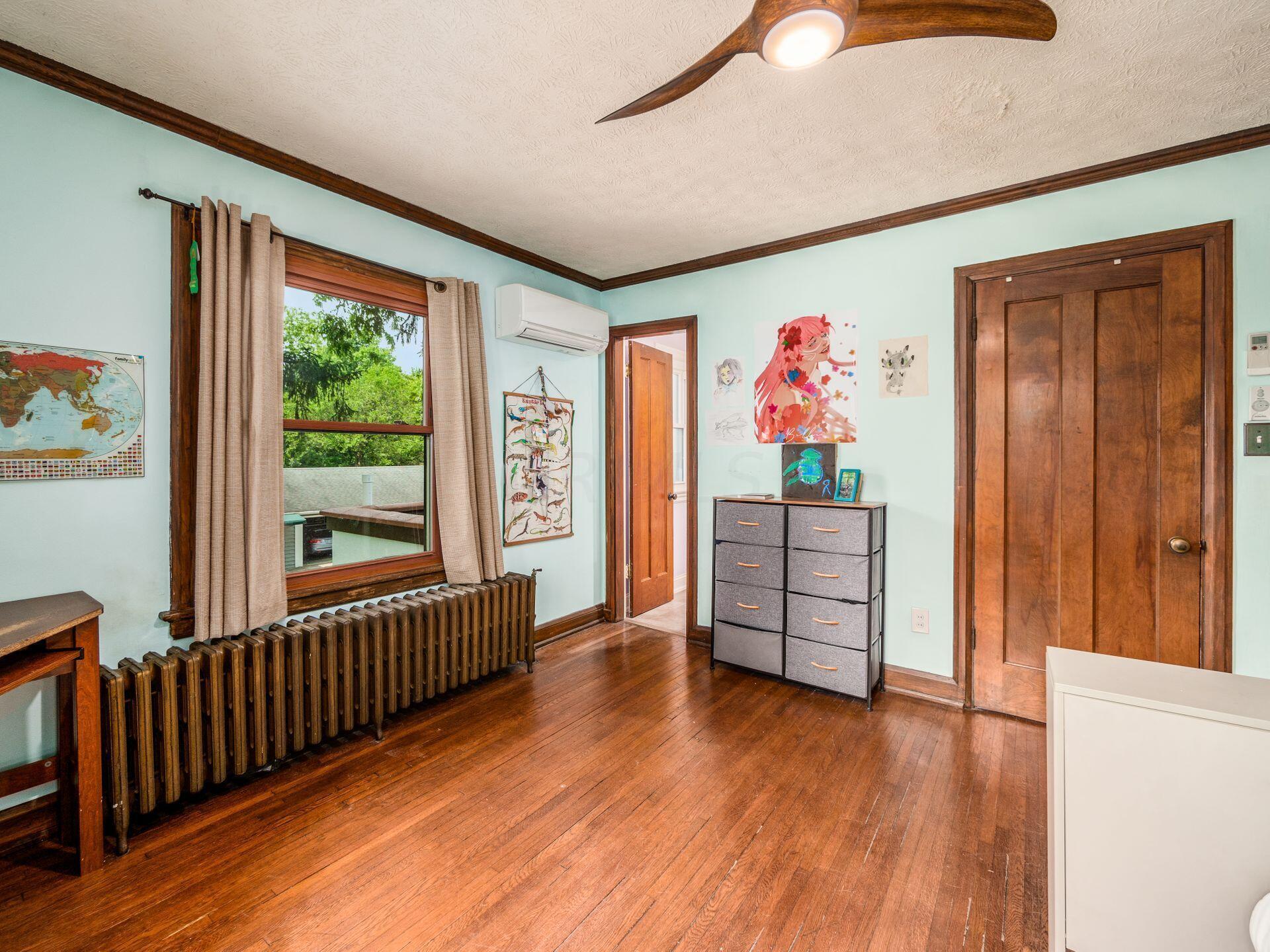 80 West Cooke Road Columbus, OH 43214 - Photo 22 of 48 Bedroom 1 oak flooring, insulated windows, entry to Jack & Jill bath