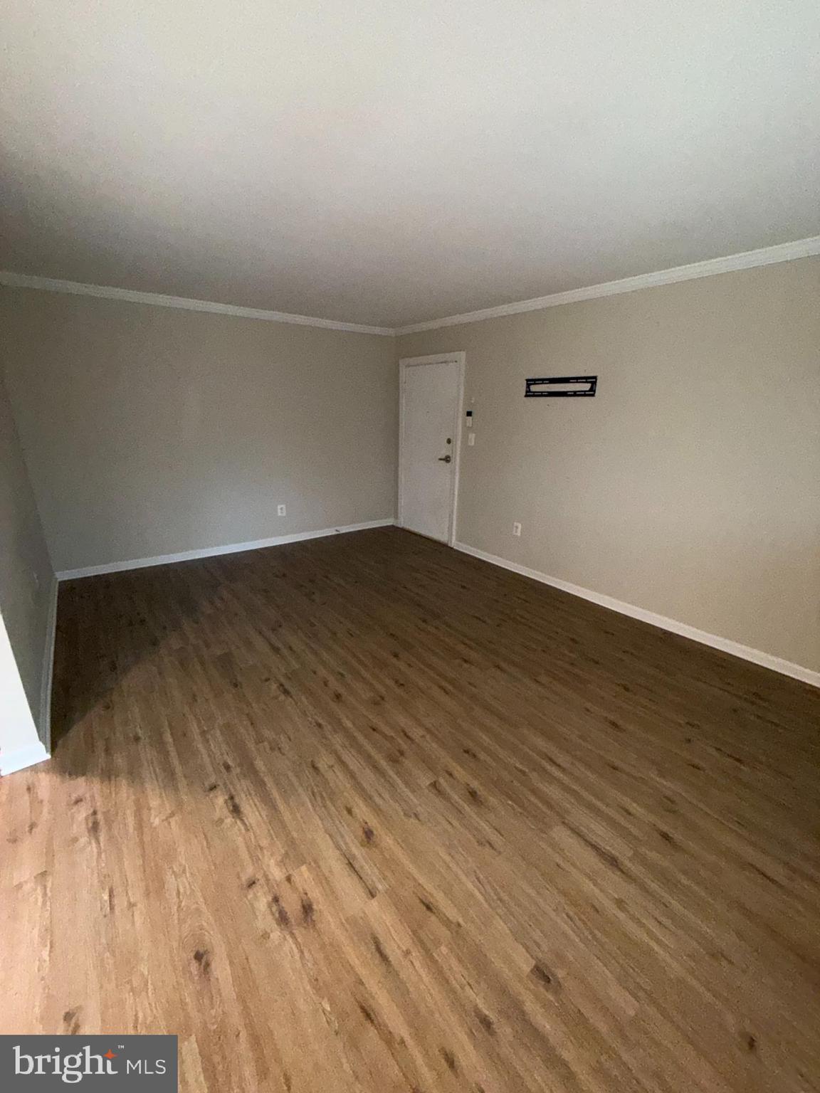 3111 Naylor Road Southeast, Unit 301 Washington, DC 20020 - Photo 8 of 11 wooden floor in a empty room
