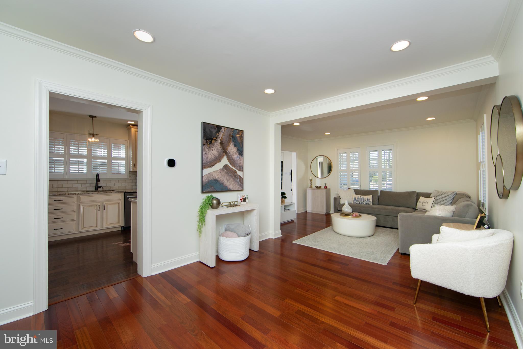 401 Spruce Street Haddonfield, NJ 08033 - Photo 11 of 40 a living room with furniture and a wooden floor