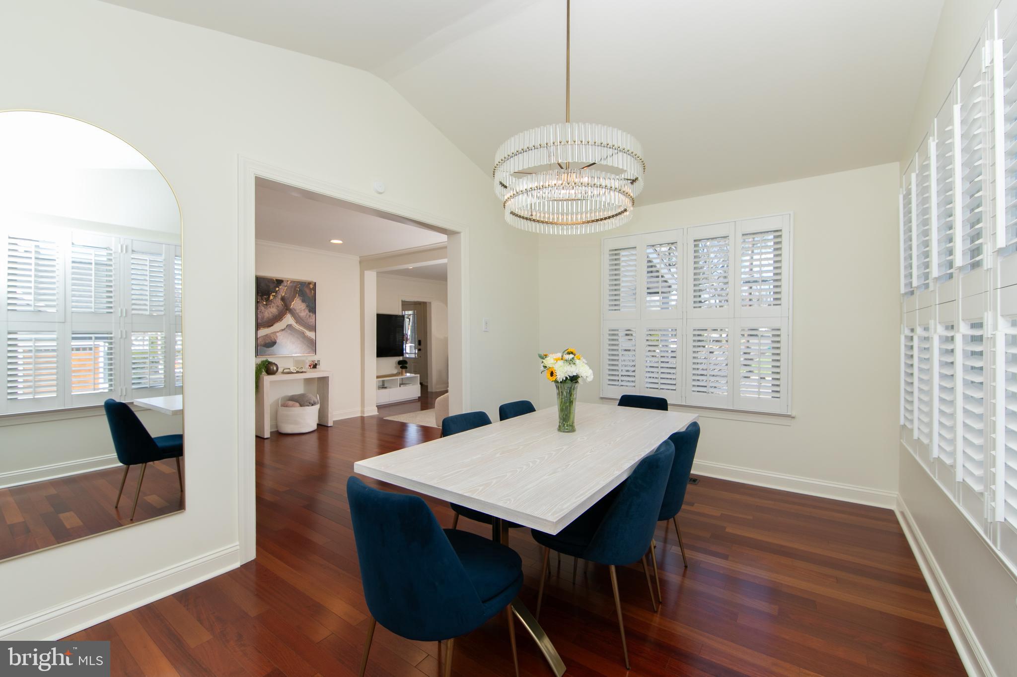 401 Spruce Street Haddonfield, NJ 08033 - Photo 14 of 40 a view of a dining room with furniture wooden floor and chandelier