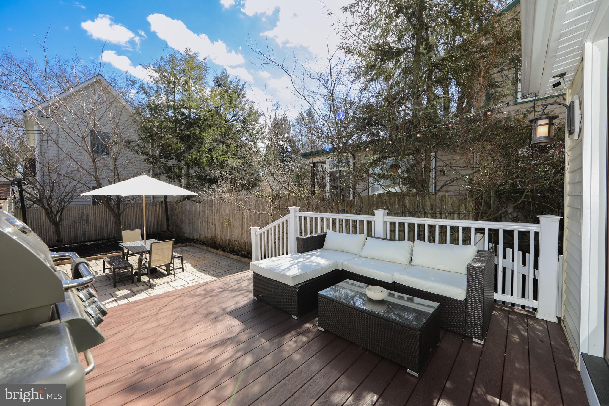 401 Spruce Street Haddonfield, NJ 08033 - Photo 34 of 40 a view of a wooden deck with furniture