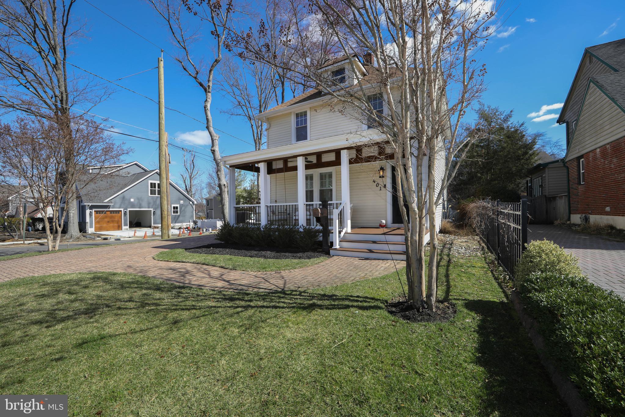401 Spruce Street Haddonfield, NJ 08033 - Photo 4 of 40 a front view of a house with a yard