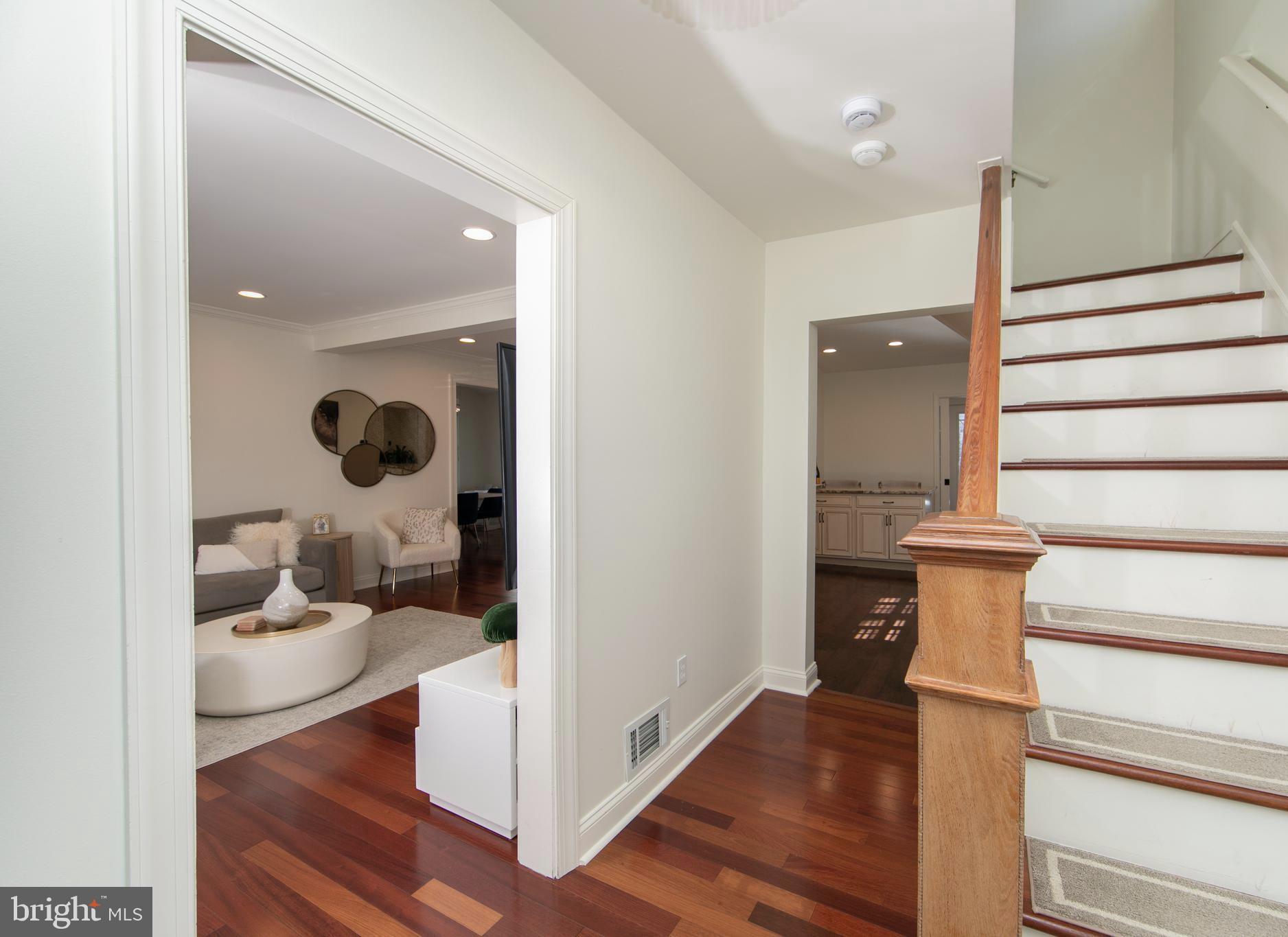 401 Spruce Street Haddonfield, NJ 08033 - Photo 6 of 40 a view of a hallway with wooden floor and entryway