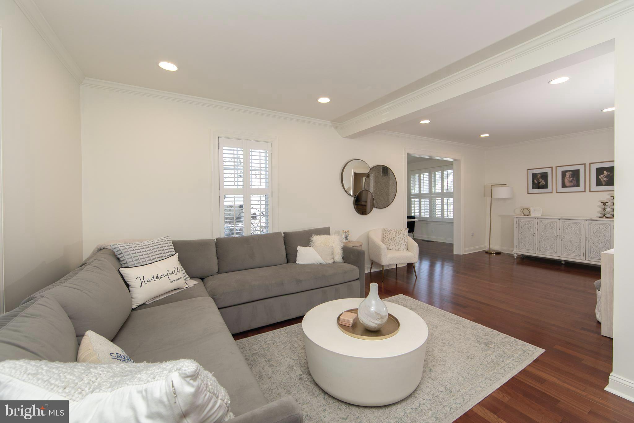 401 Spruce Street Haddonfield, NJ 08033 - Photo 7 of 40 a living room with furniture and a wooden floor