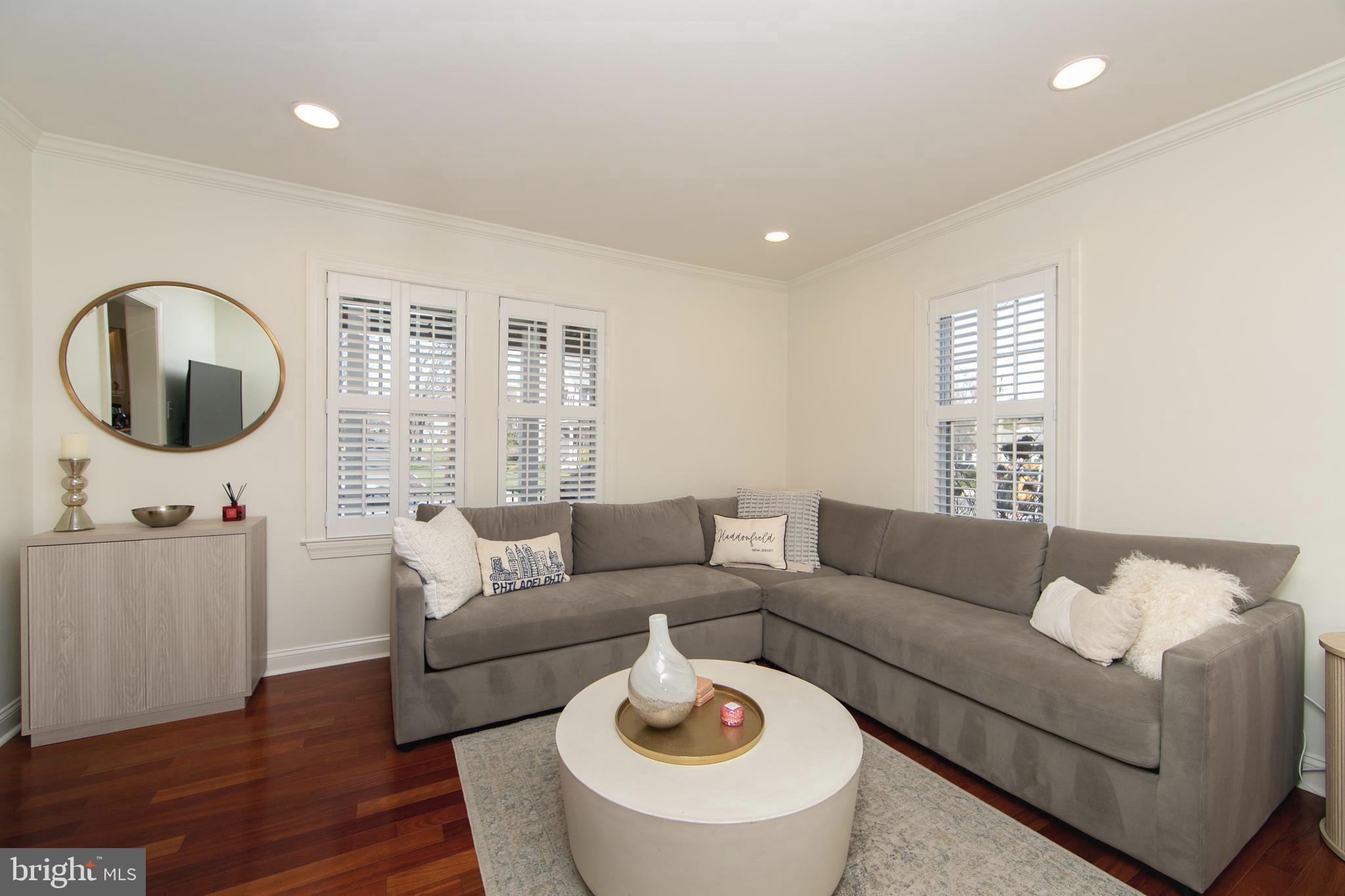 401 Spruce Street Haddonfield, NJ 08033 - Photo 8 of 40 a living room with furniture and a large window