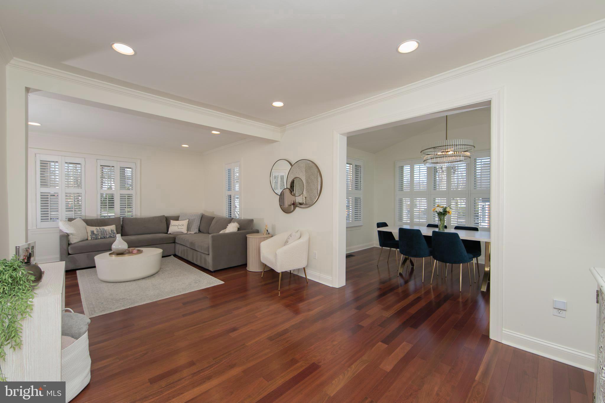 401 Spruce Street Haddonfield, NJ 08033 - Photo 10 of 40 a living room with fireplace furniture and a wooden floor