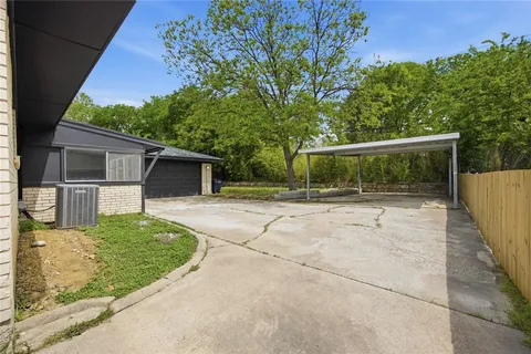 a view of backyard with green space