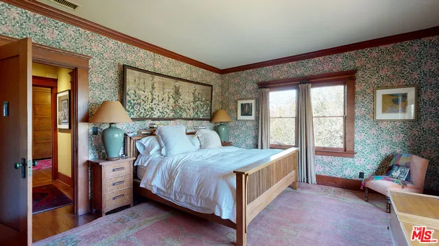 a view of a kitchen with a refrigerator and a stove