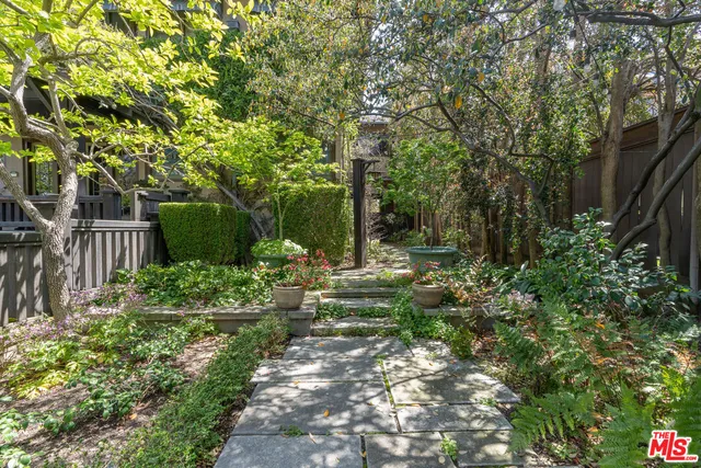 a view of a chairs and table in wooden floor