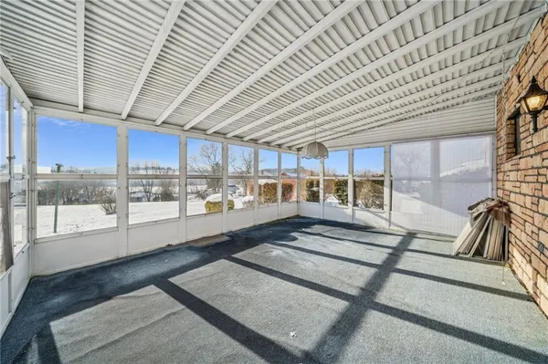 a large room with wooden floor