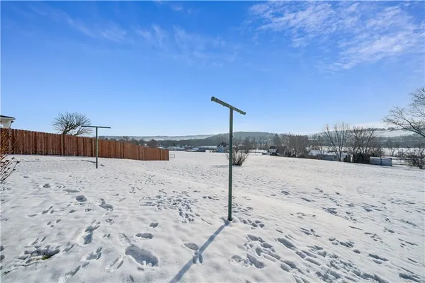 a view of a backyard of a house