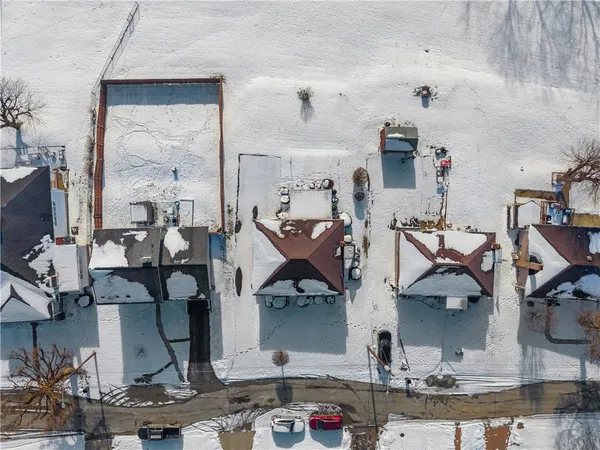 an aerial view of residential house with parking space