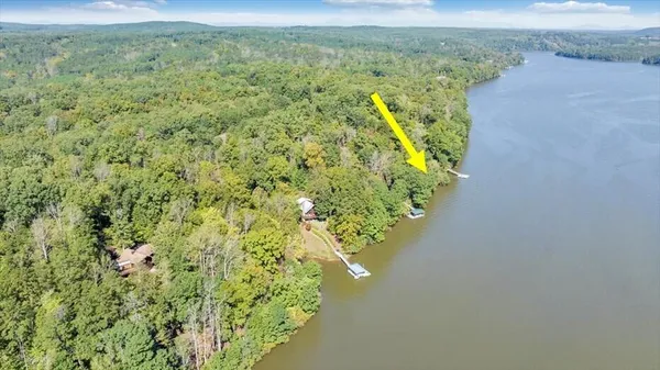 a view of a lake with a mountain in the background