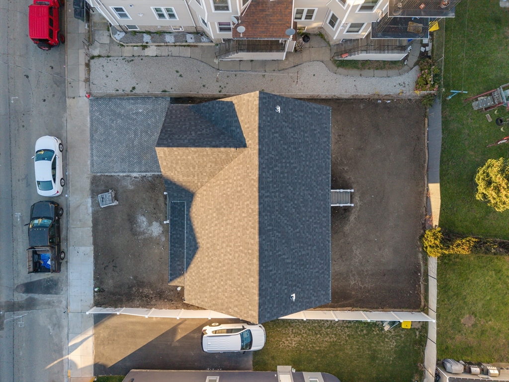 138 18th Street Fall River, MA 02723 - Photo 3 of 14 an aerial view of a house with outdoor space