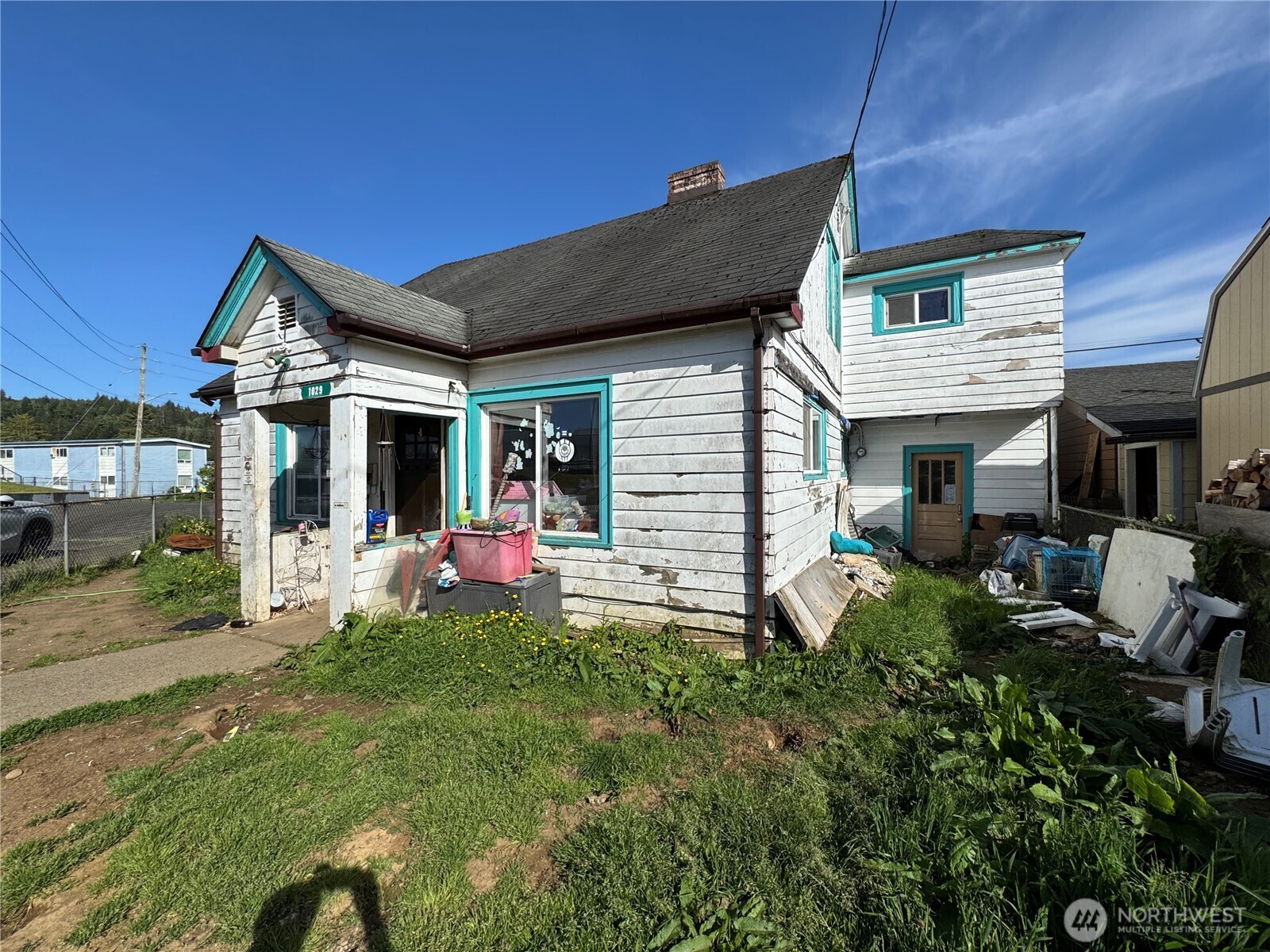 1029 Cleveland Street Aberdeen, WA 98520 - Photo 2 of 25 a view of a house with backyard porch and sitting area