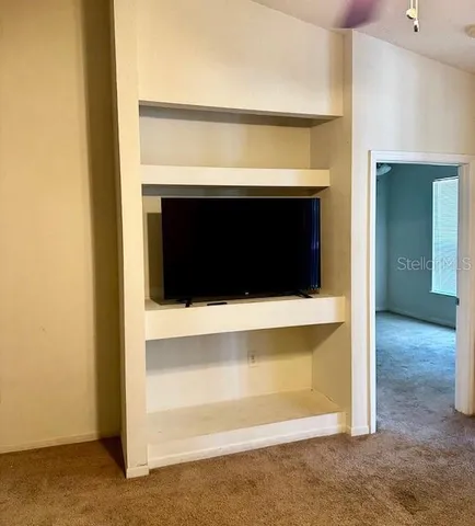 a living room with a fireplace