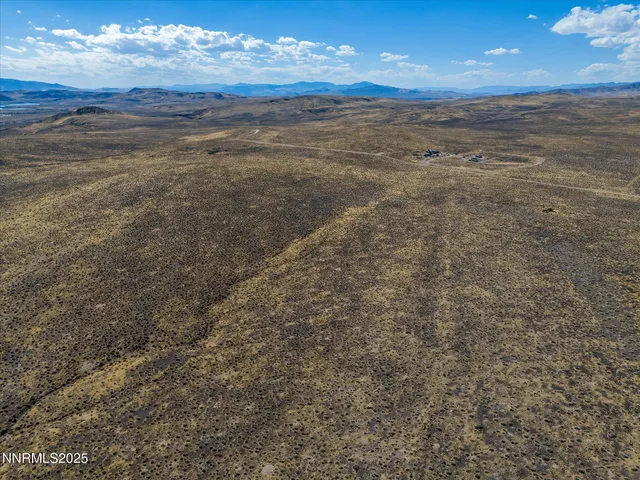 a view of an ocean and mountain