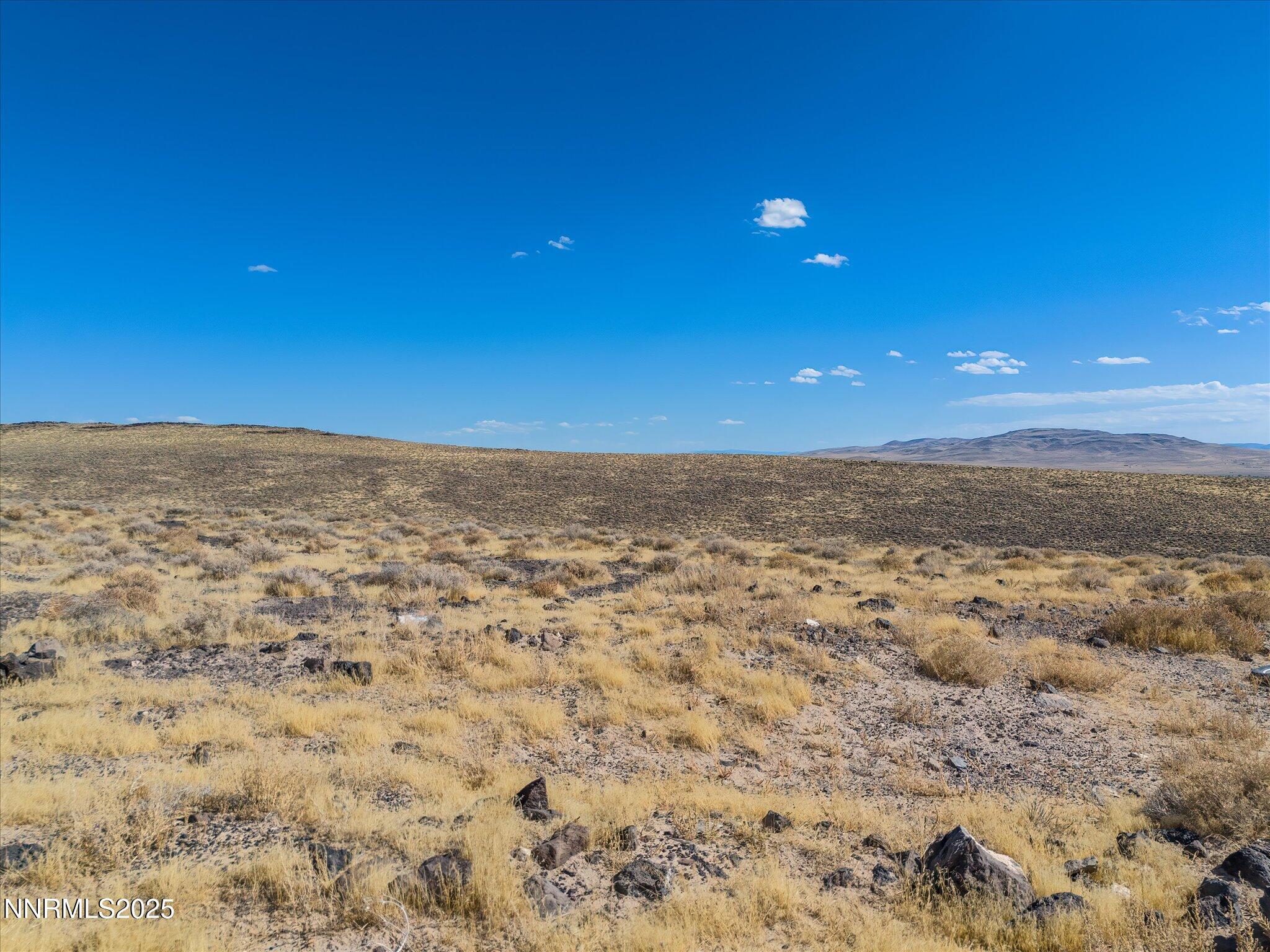 702160 Churchill Street Fallon, NV 89406 - Photo 26 of 51 a view of a big room with mountain view