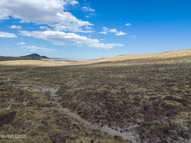 a view of an ocean and mountain