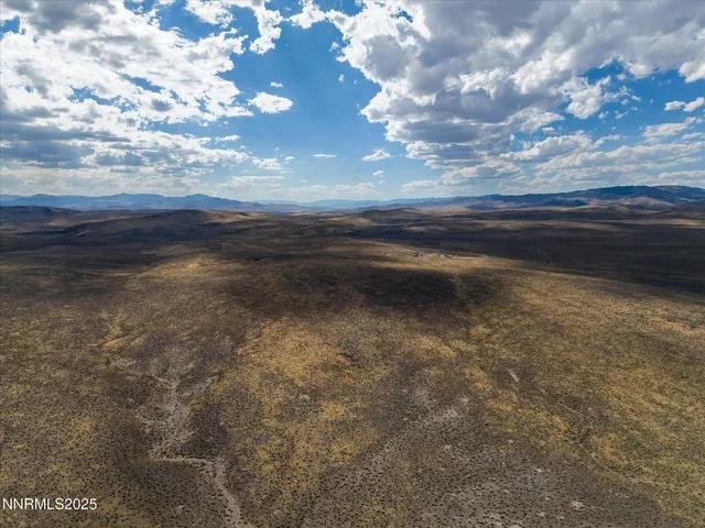 a view of a swimming pool and an outdoor space