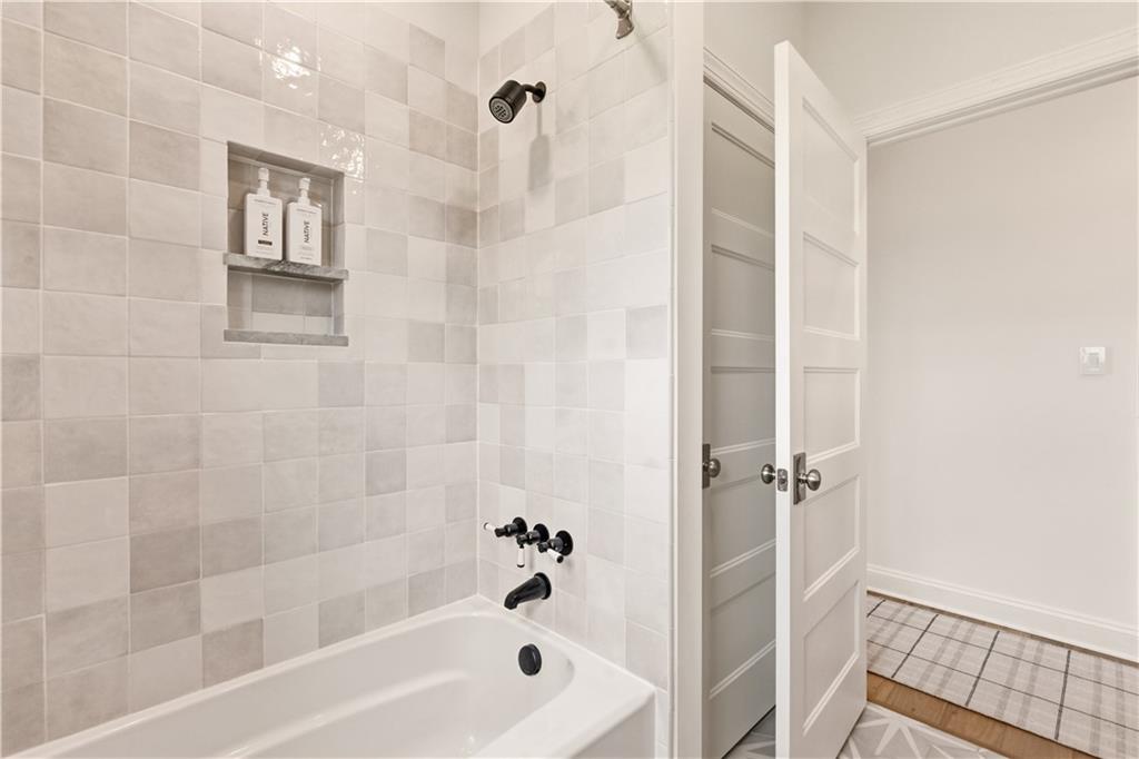 315 Stewarton Road Mill Run, PA 15464 - Photo 37 of 47 a bathroom with a bathtub