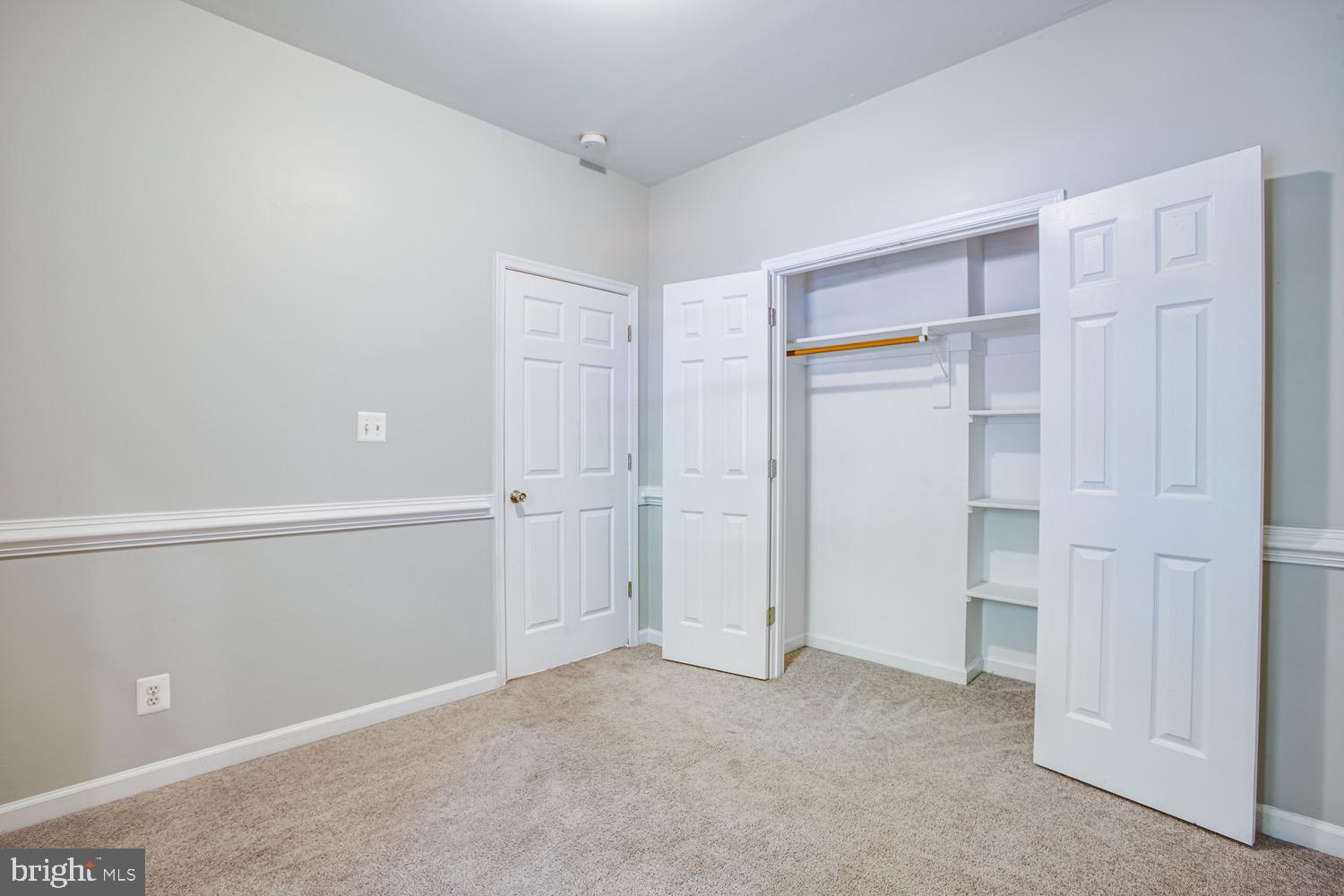218 Cedar Ridge Drive Ruther Glen, VA 22546 - Photo 19 of 30 Bedroom closet with built-in shelving