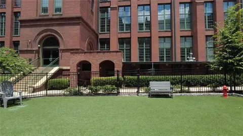 a view of an chairs and tables in the patio