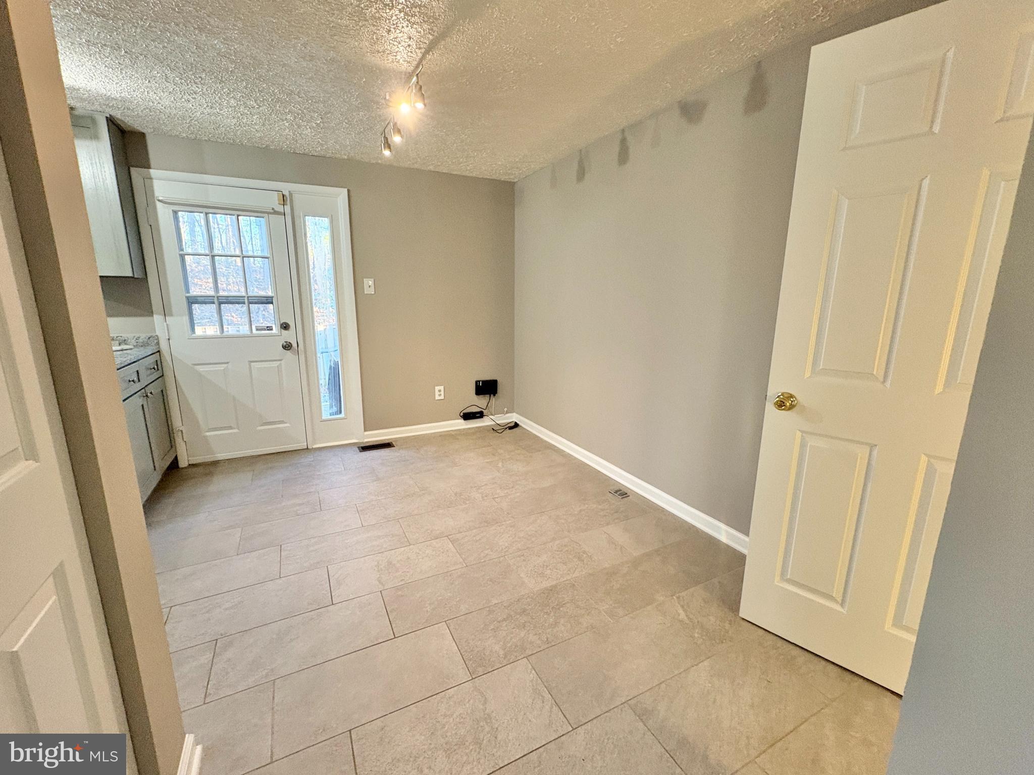 8263 Burning Forest Court Springfield, VA 22153 - Photo 14 of 43 a view of an empty room