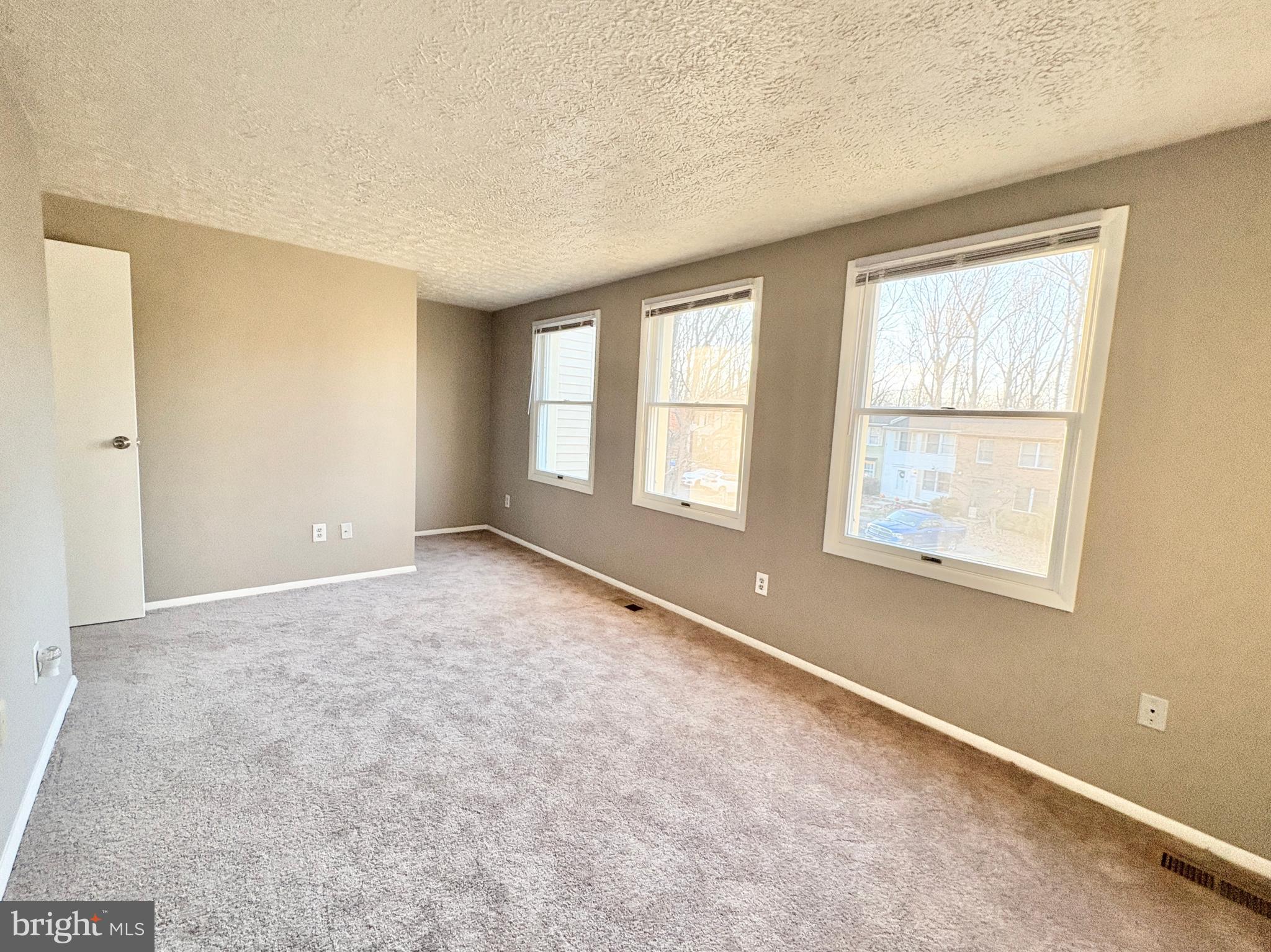 8263 Burning Forest Court Springfield, VA 22153 - Photo 19 of 43 an empty room with windows
