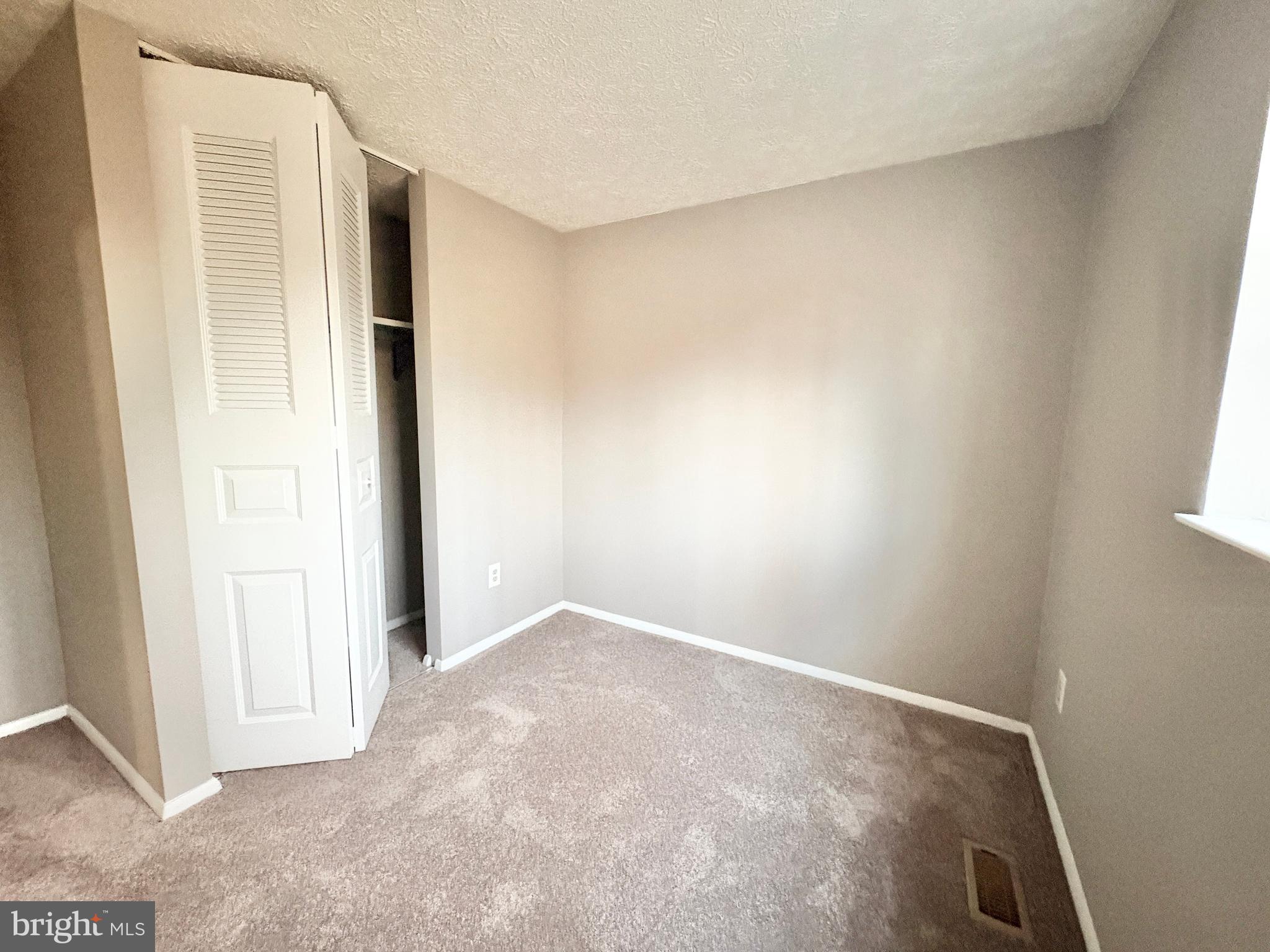 8263 Burning Forest Court Springfield, VA 22153 - Photo 22 of 43 an empty room with windows