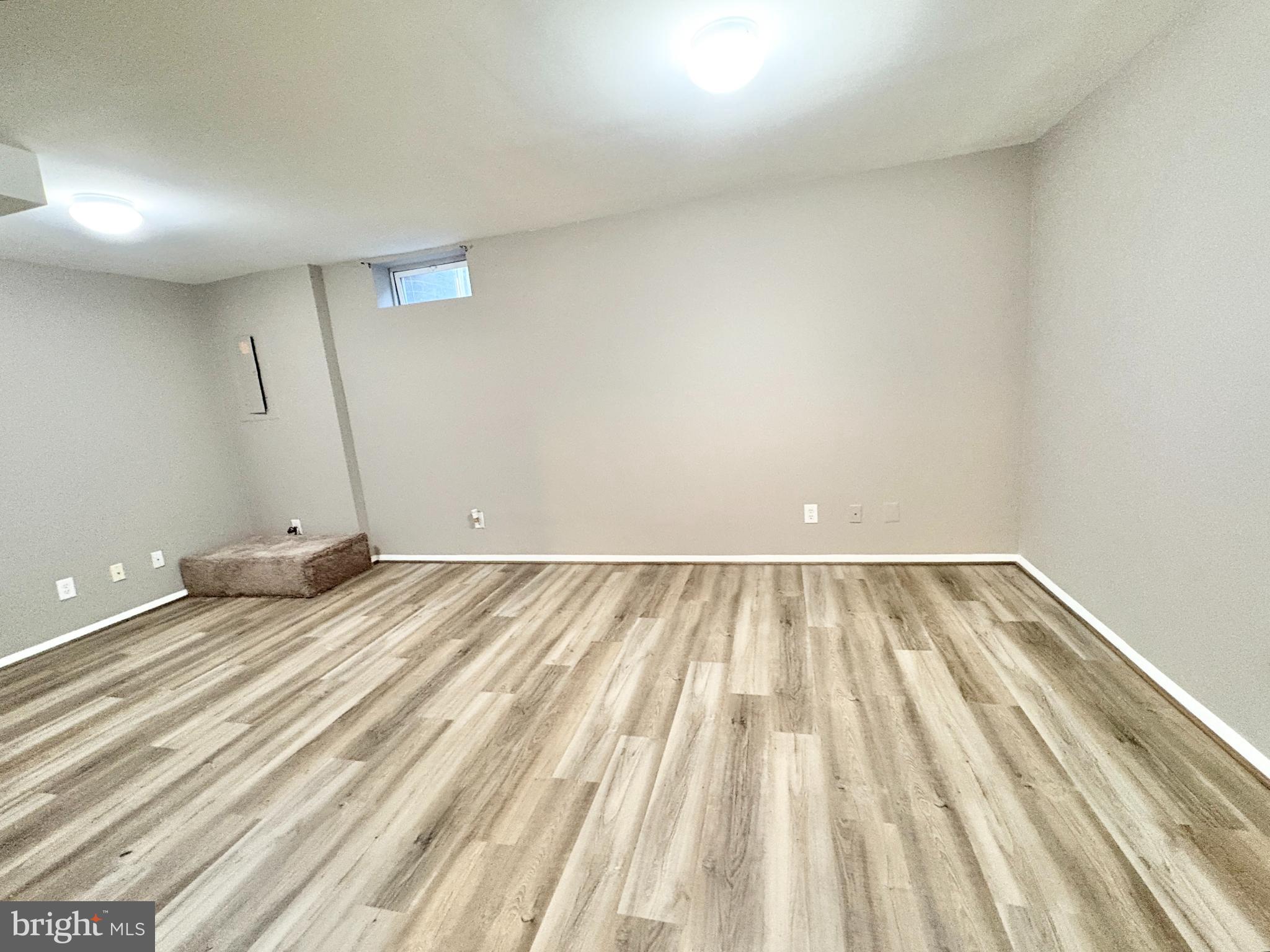8263 Burning Forest Court Springfield, VA 22153 - Photo 29 of 43 a view of a room with wooden floor