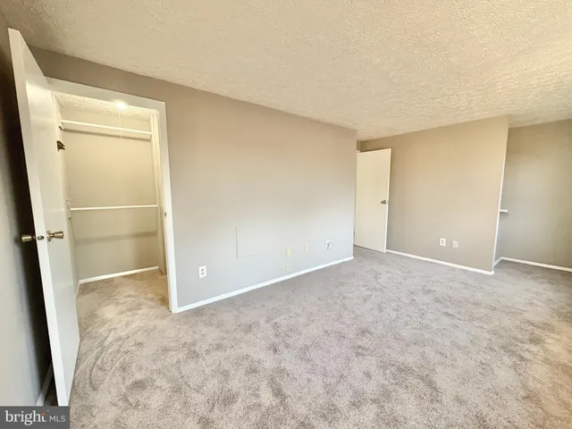 an empty room with sliding door
