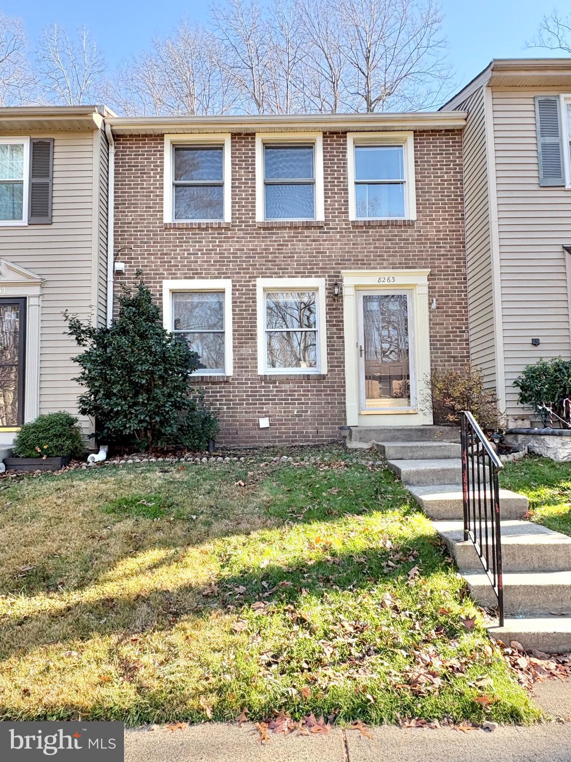 8263 Burning Forest Court Springfield, VA 22153 - Photo 7 of 43 a front view of house with yard