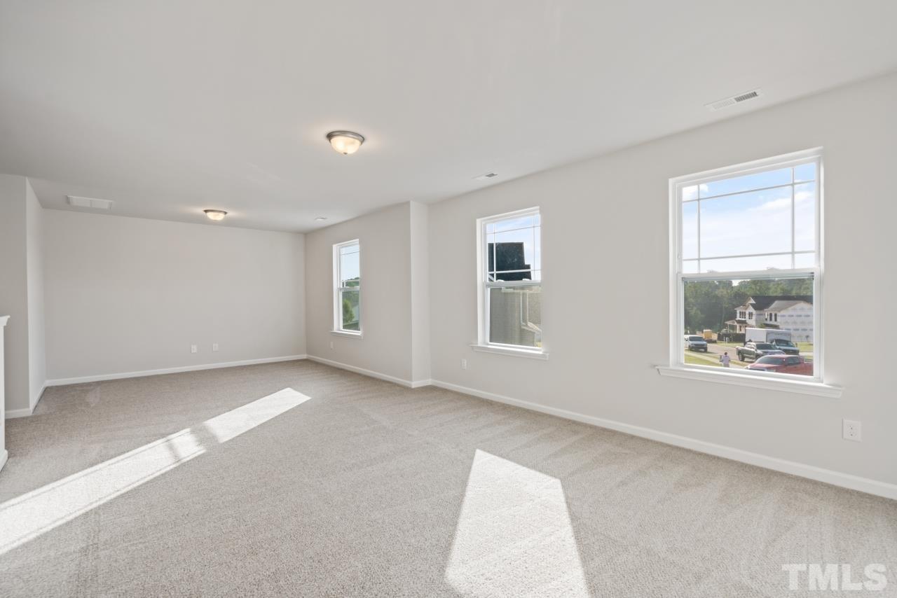 129 Scoville Road Garner, NC 27529 - Photo 25 of 25 a view of an empty room with window