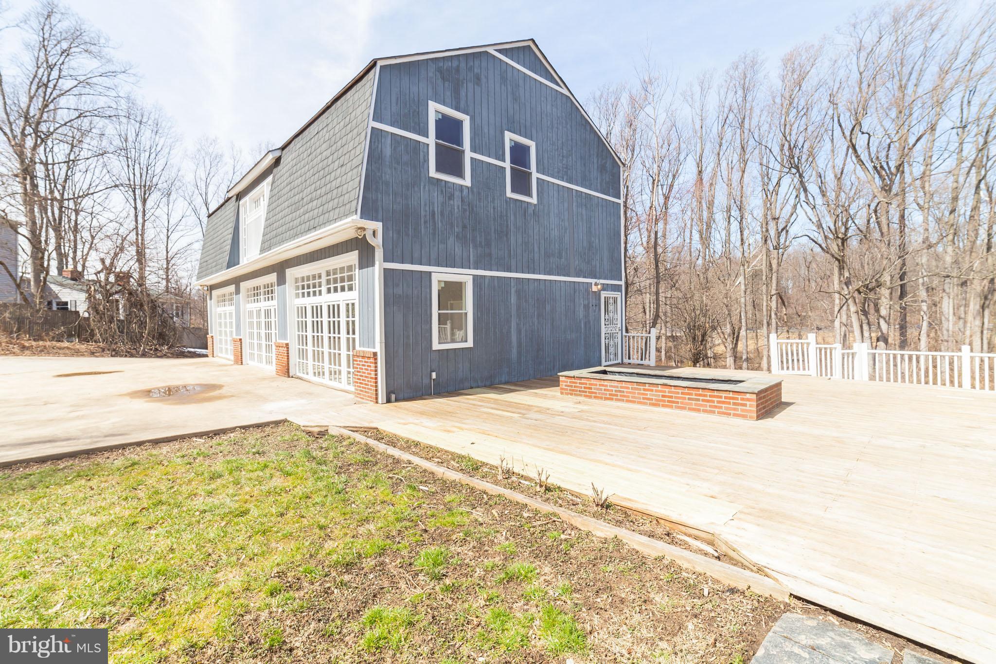 321 Duxbury Road Silver Spring, MD 20905 - Photo 25 of 30 deck and garage side entrance