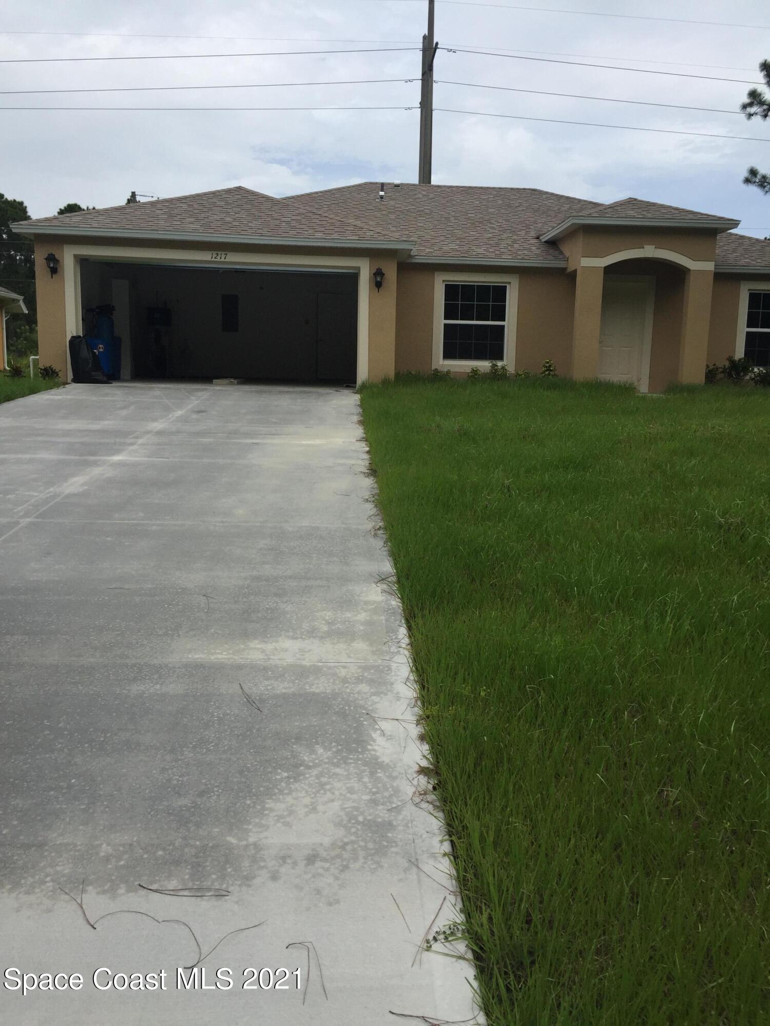 1217 Harlingen Road Southwest Palm Bay, FL 32908 - Photo 1 of 16 IMG_5545 2