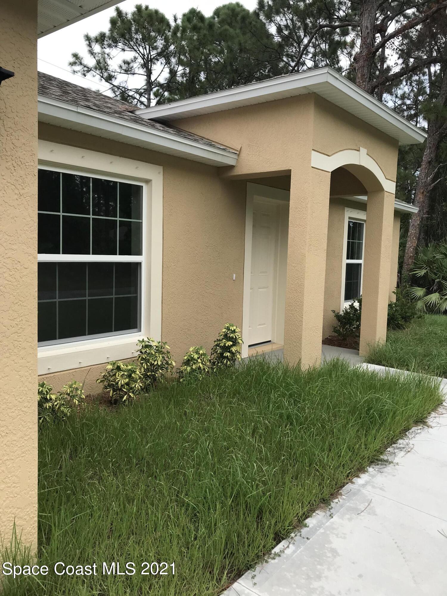 1217 Harlingen Road Southwest Palm Bay, FL 32908 - Photo 2 of 16 IMG_3030