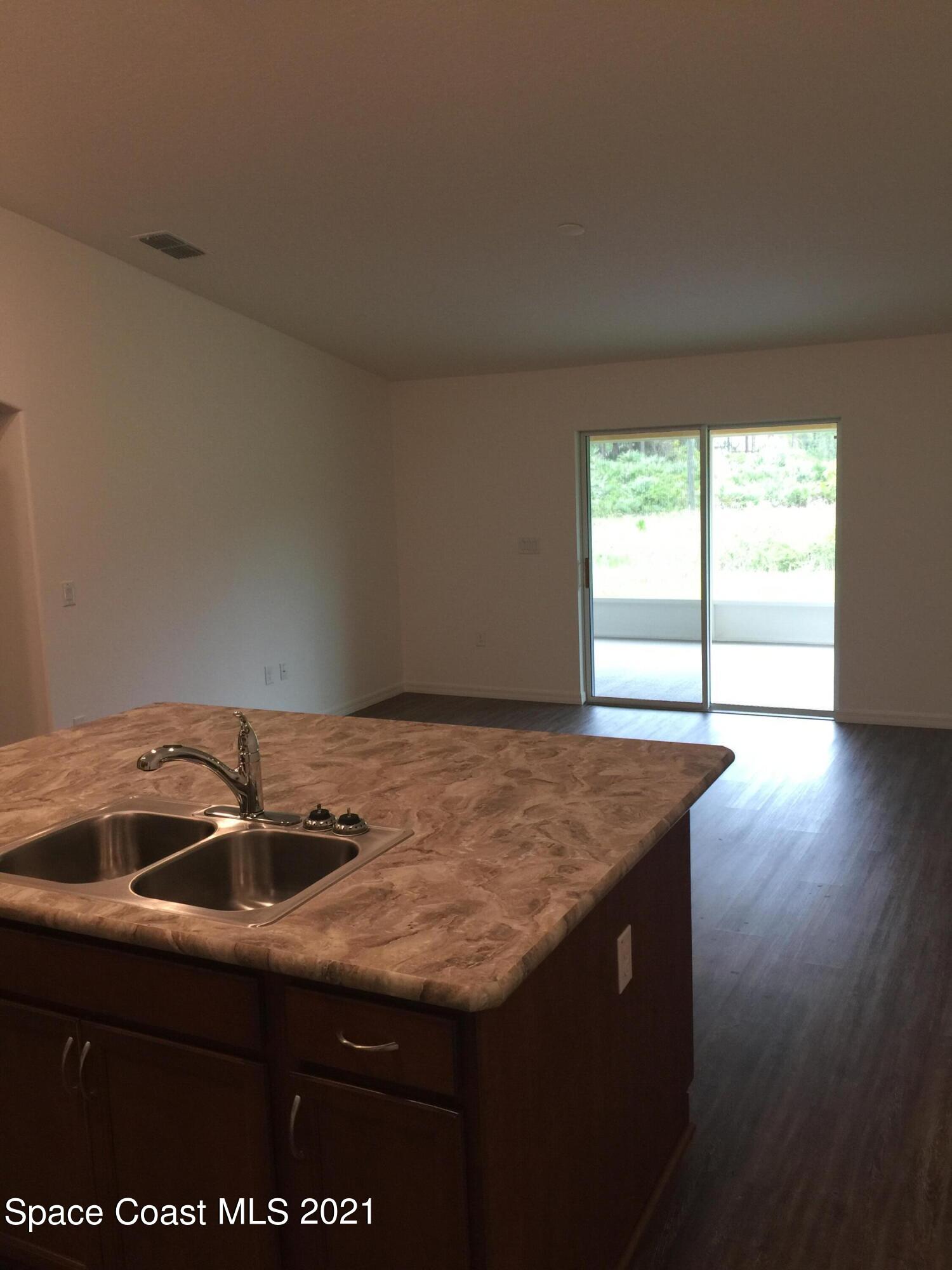 1217 Harlingen Road Southwest Palm Bay, FL 32908 - Photo 3 of 16 IMG_5533